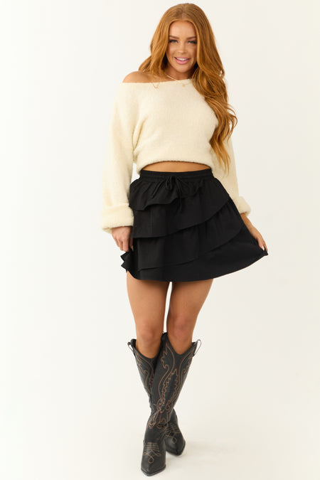 Black Asymmetrical Ruffle Smocked Mini Skirt