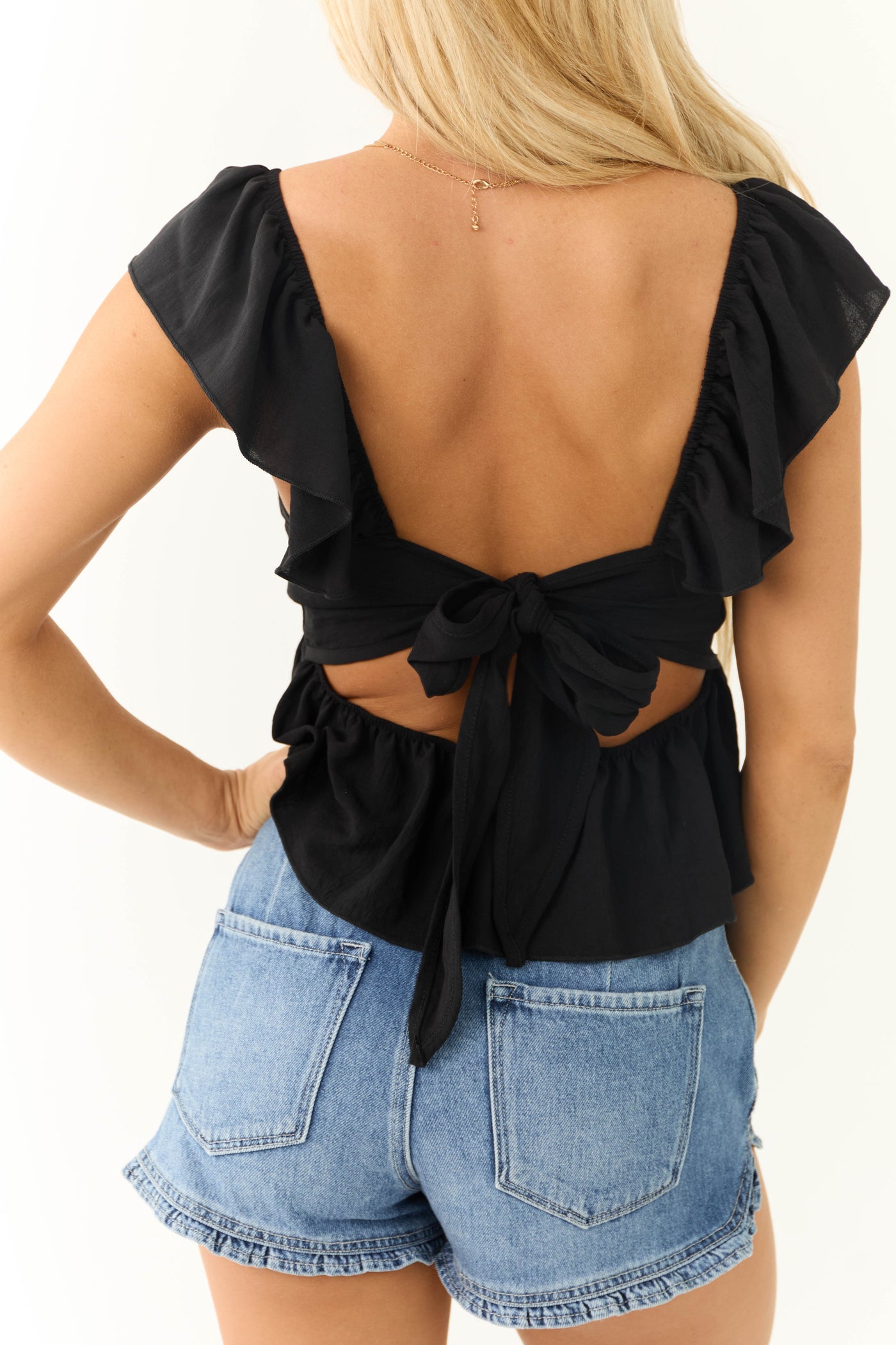 Black Flutter Sleeve Tie Back Peplum Blouse