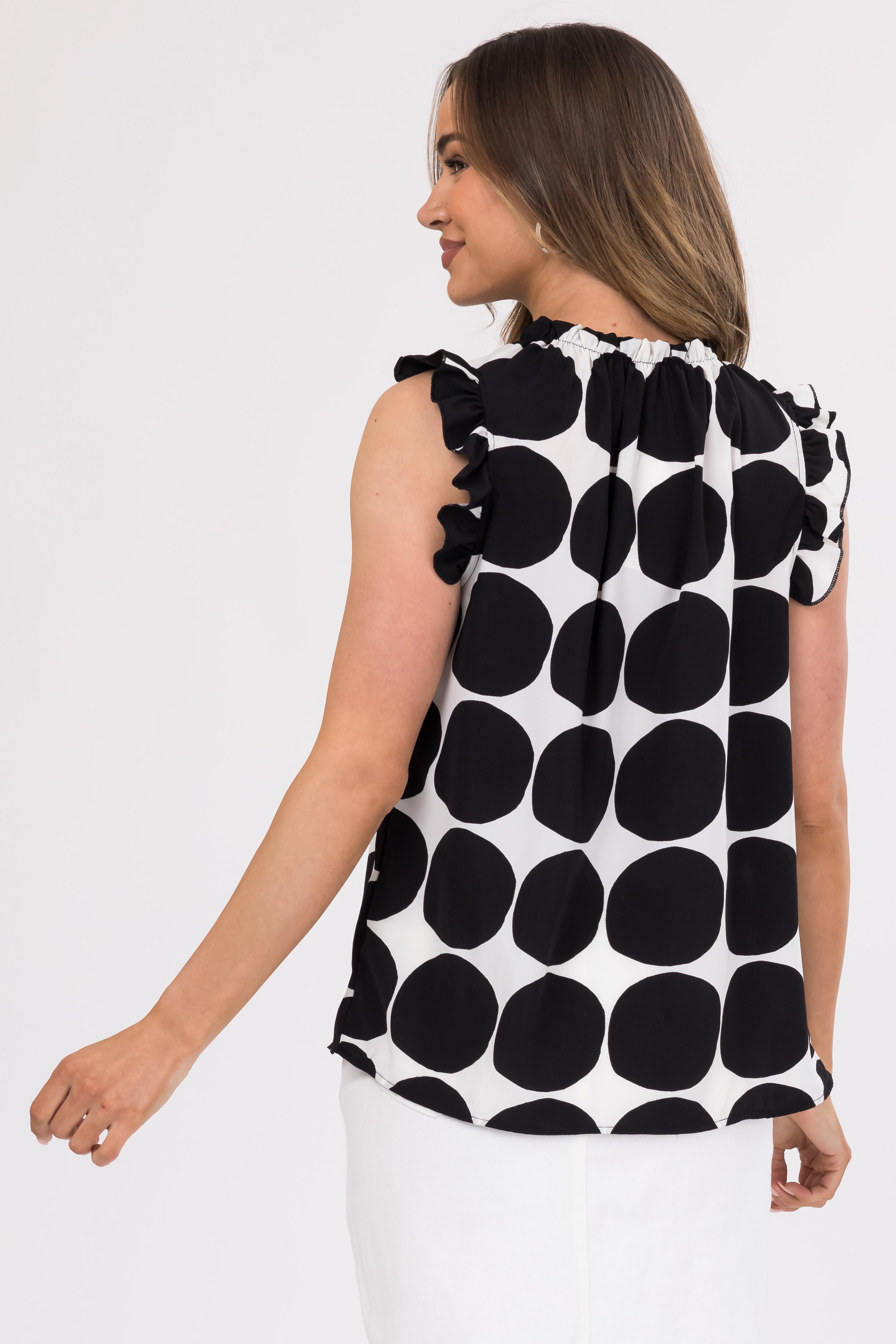 Black and Ivory Polka Dot Ruffle Cap Sleeve Top