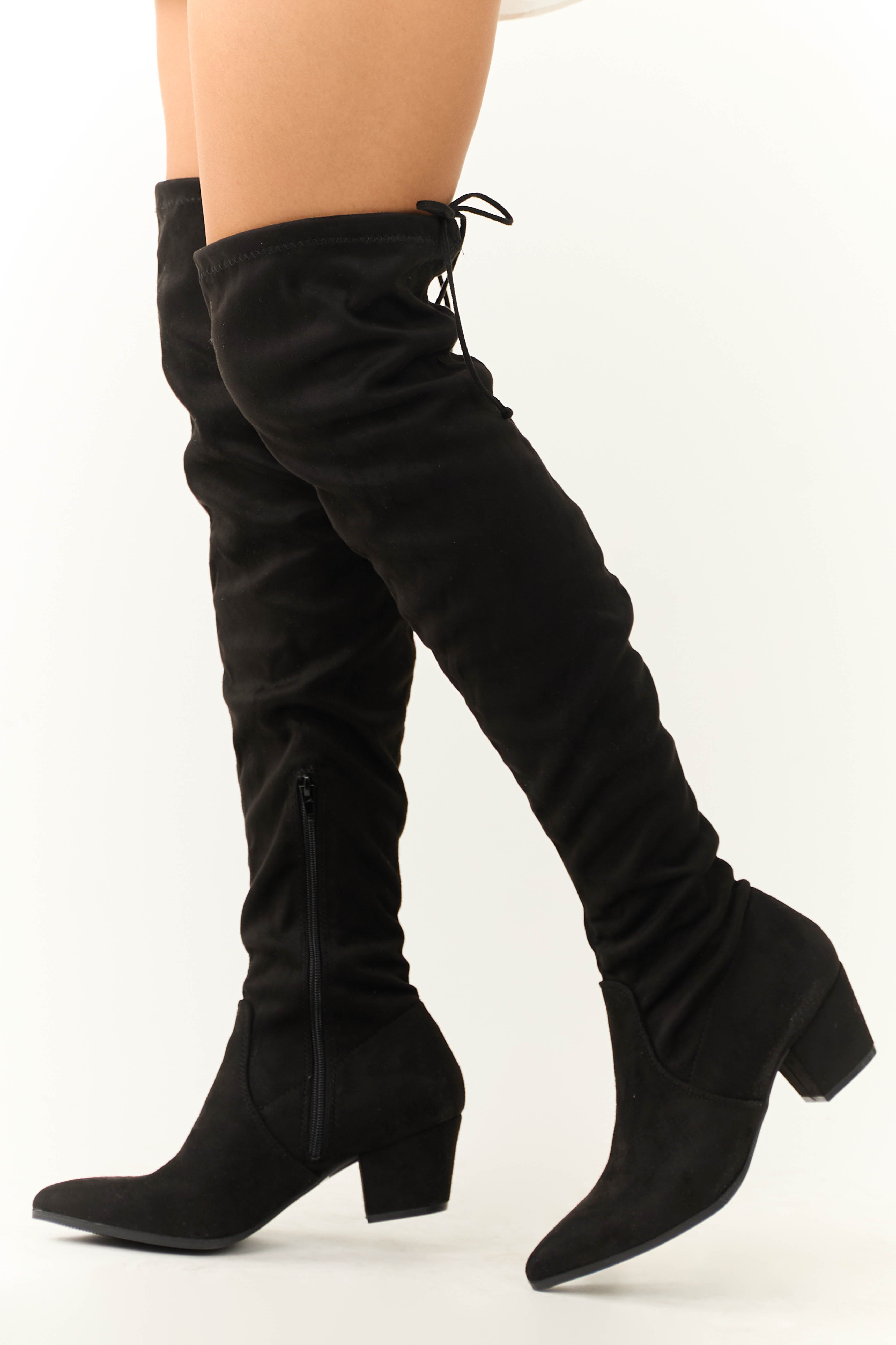 Anah faux suede fluffy tassel knee high boots in black best sale