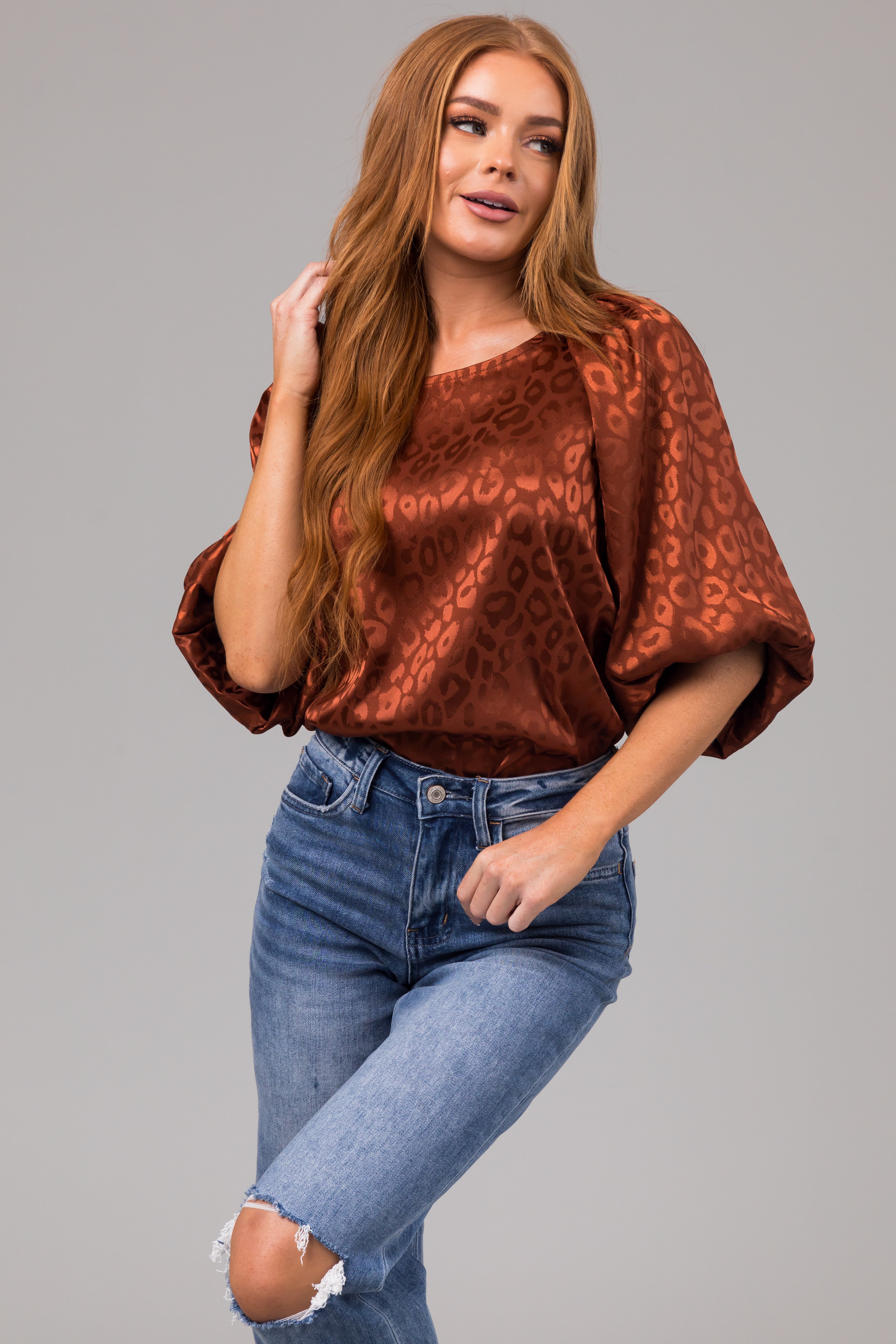 Cinnamon Animal Print Puff Sleeve Satin Top