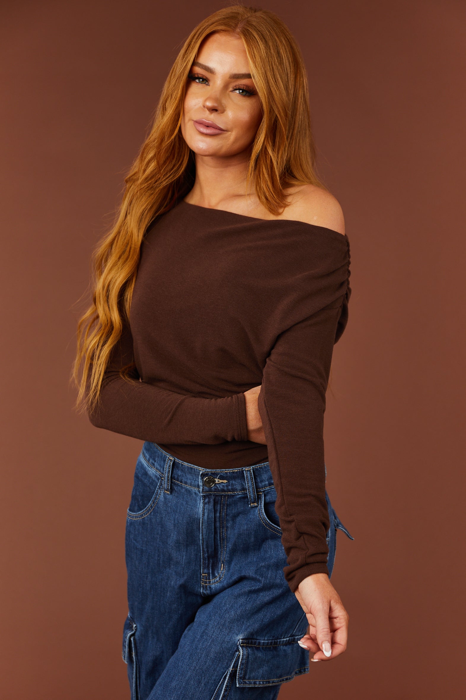 Long sleeve ruched discount off the shoulder top