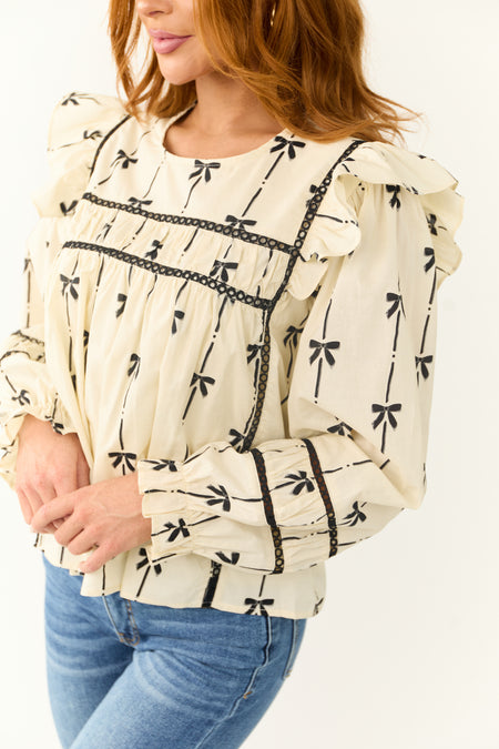 Cream Bow Print Long Sleeve Top