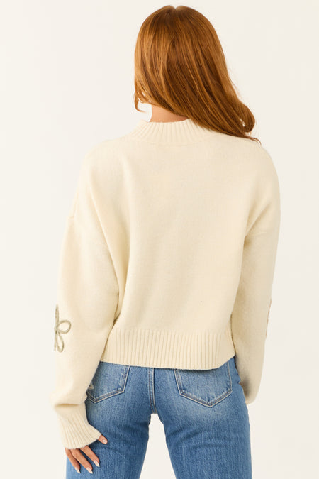 Cream Mock Neck Floral Applique Sweater