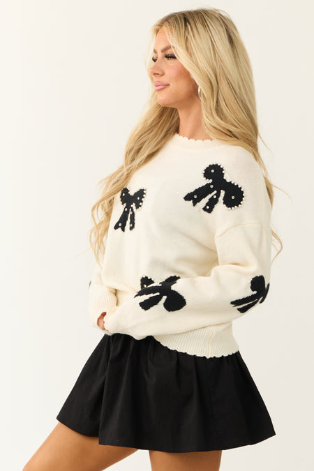 Ivory Bow Print Sweater with Pearls and Rhinestones