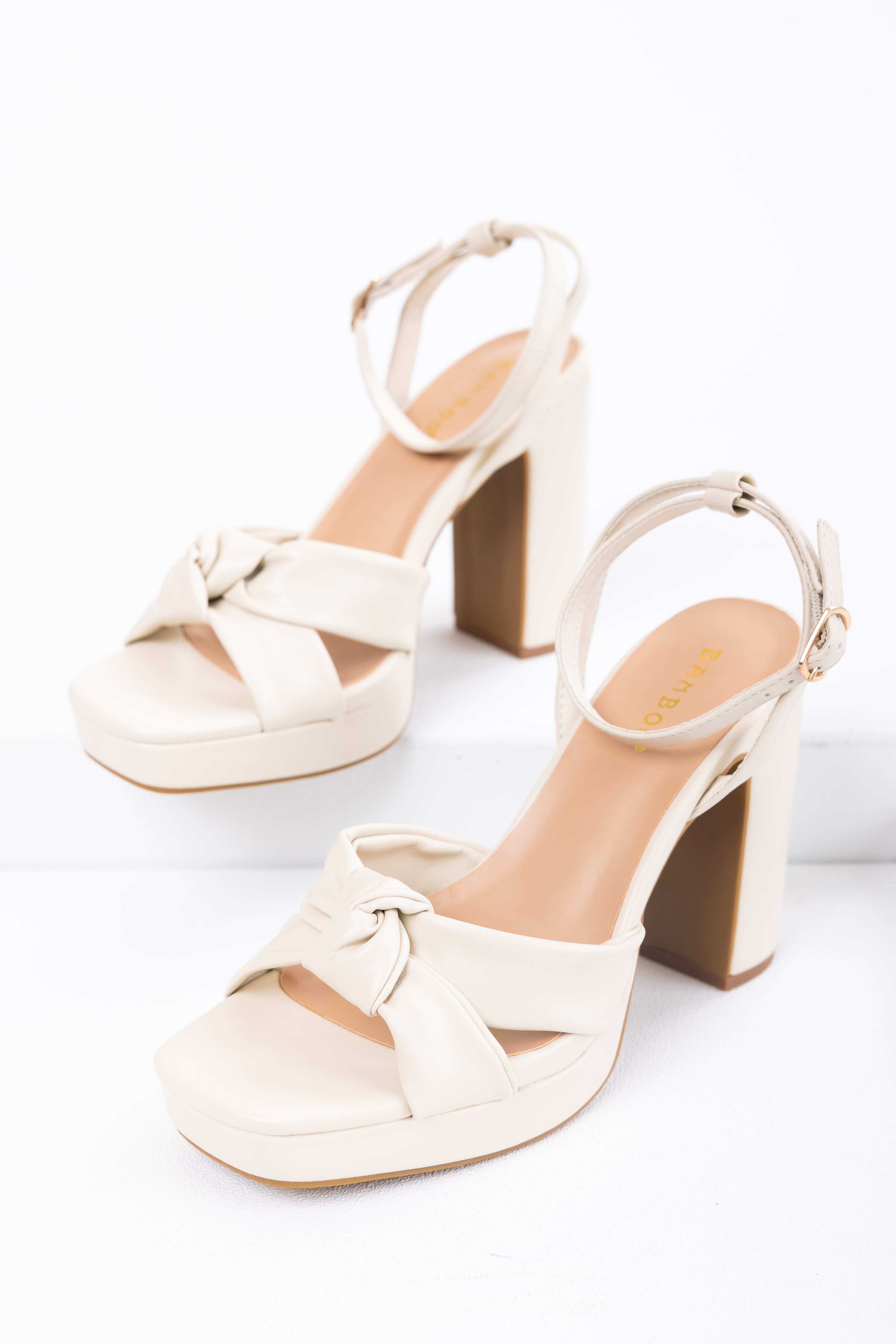 Ivory Knot Strap Faux Leather Platform Heels