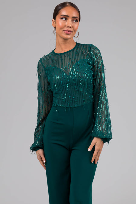 Jade Sequin Fringe Long Sleeve Flare Jumpsuit