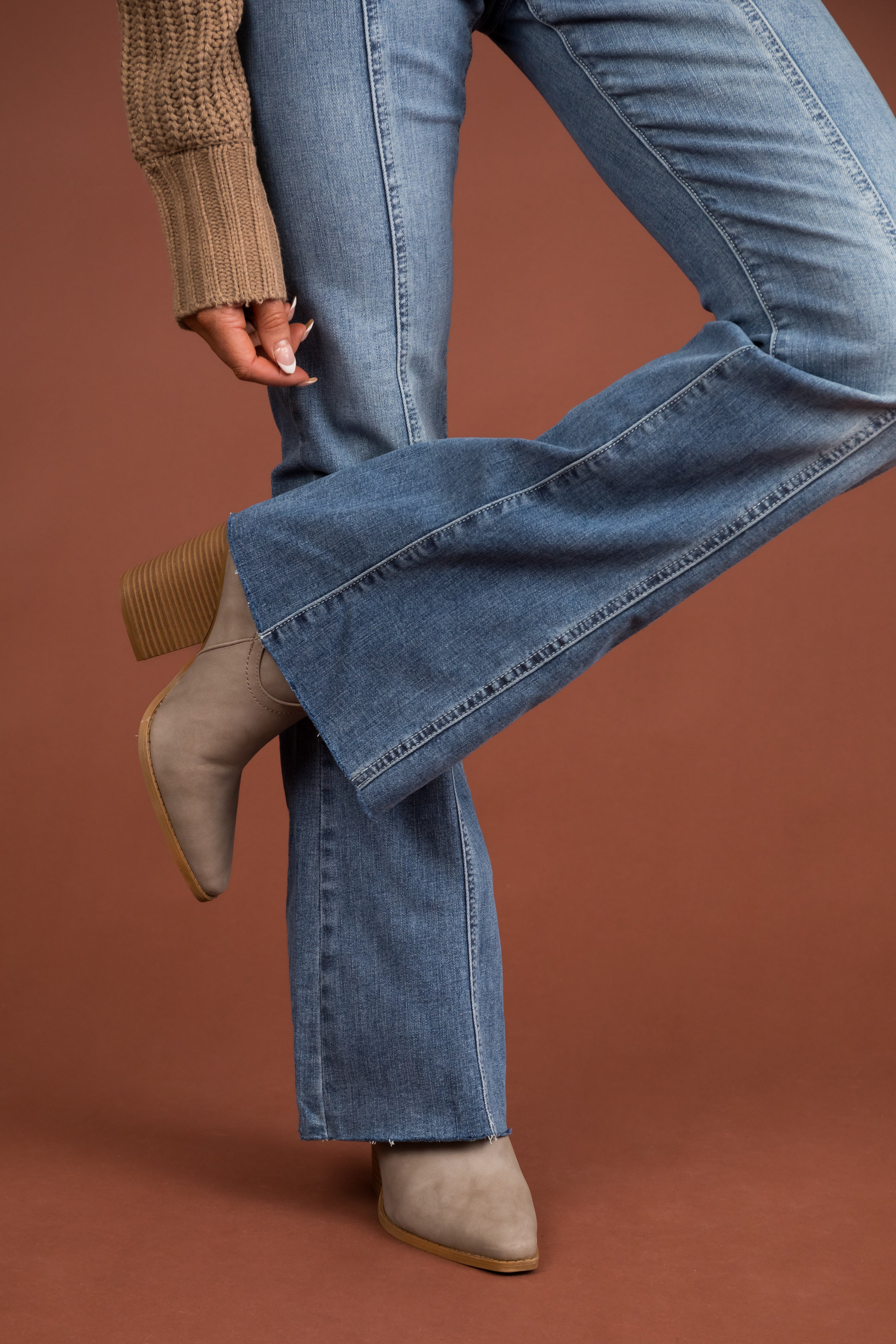 Light Wash High Rise Flare Leg Raw Hem Jeans