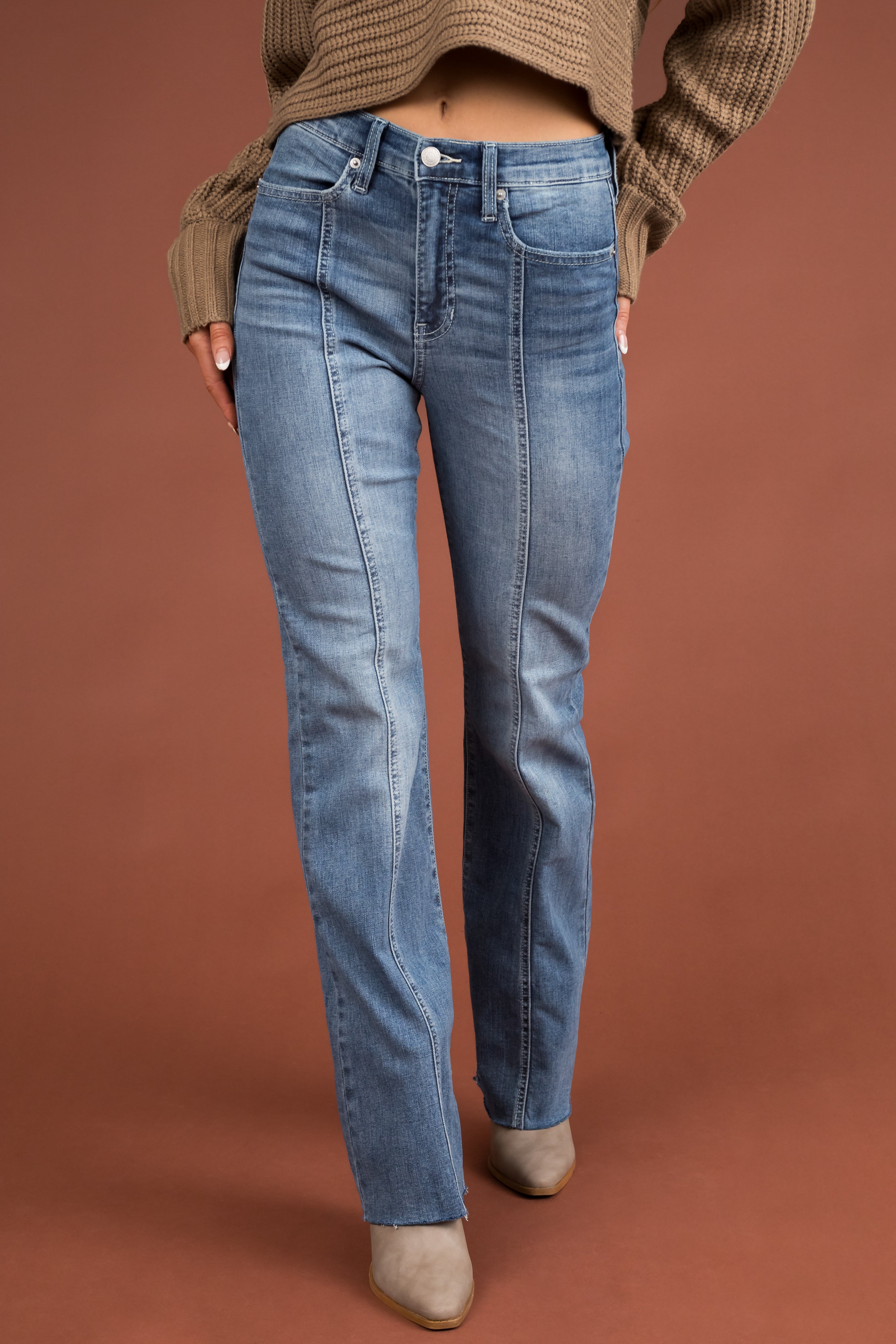 Light Wash High Rise Flare Leg Raw Hem Jeans