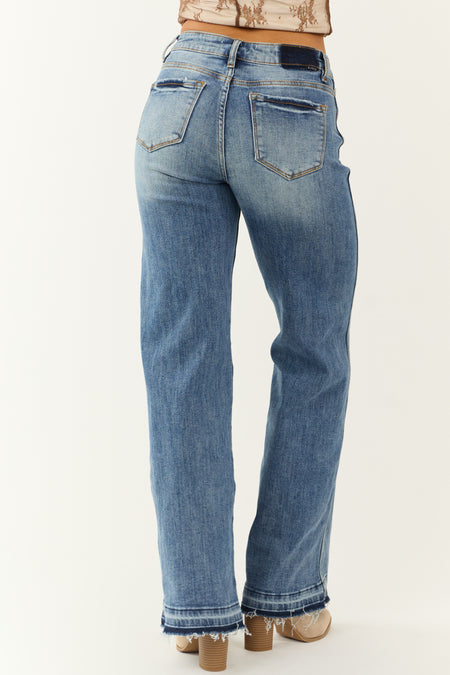 Risen Medium Wash Wide Leg Released Hem Jeans