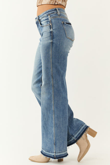 Risen Medium Wash Wide Leg Released Hem Jeans