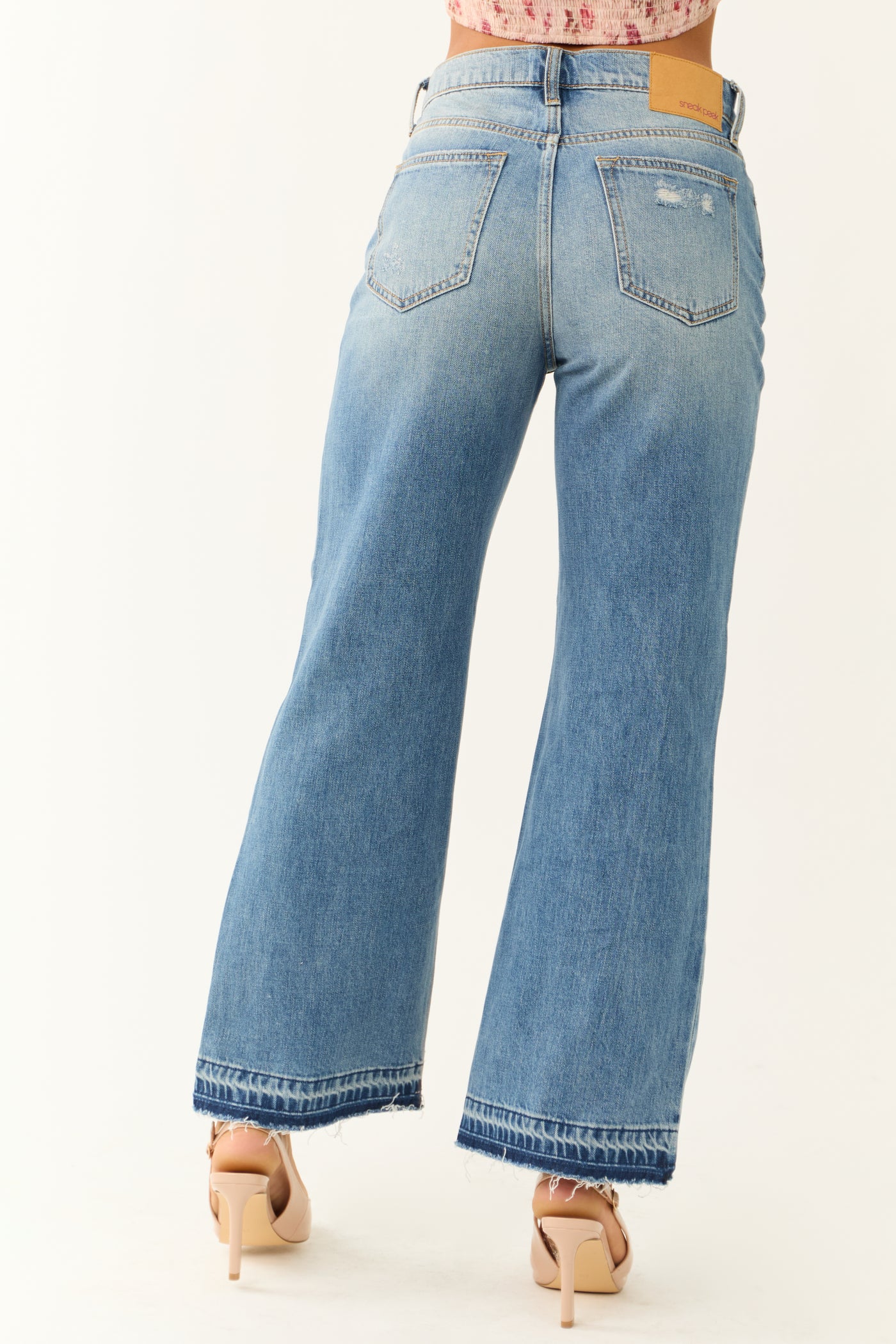 Sneak Peek Medium Wash Distressed Hem Jeans