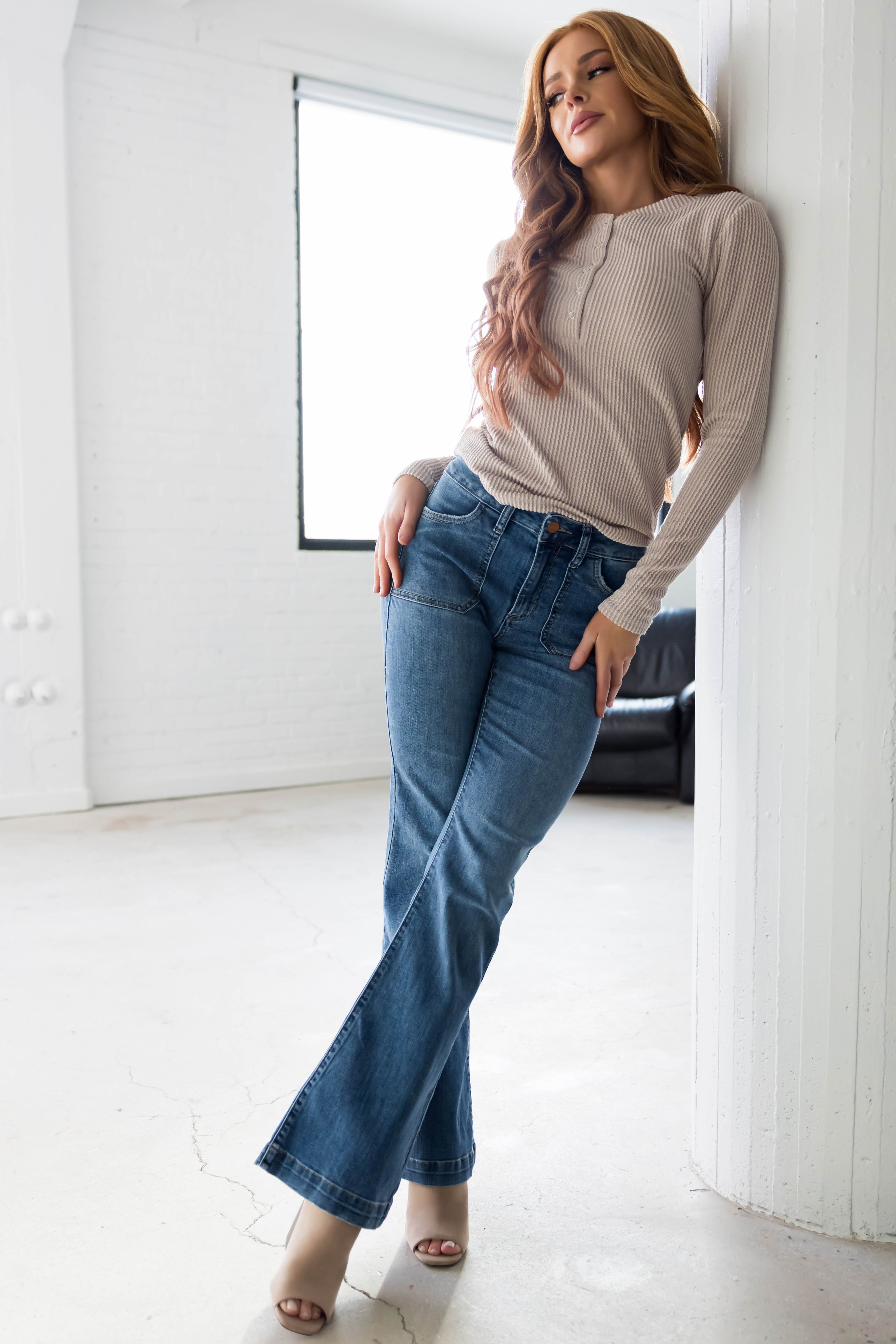 Sneak Peek Medium Wash Mid Rise Flare Jeans