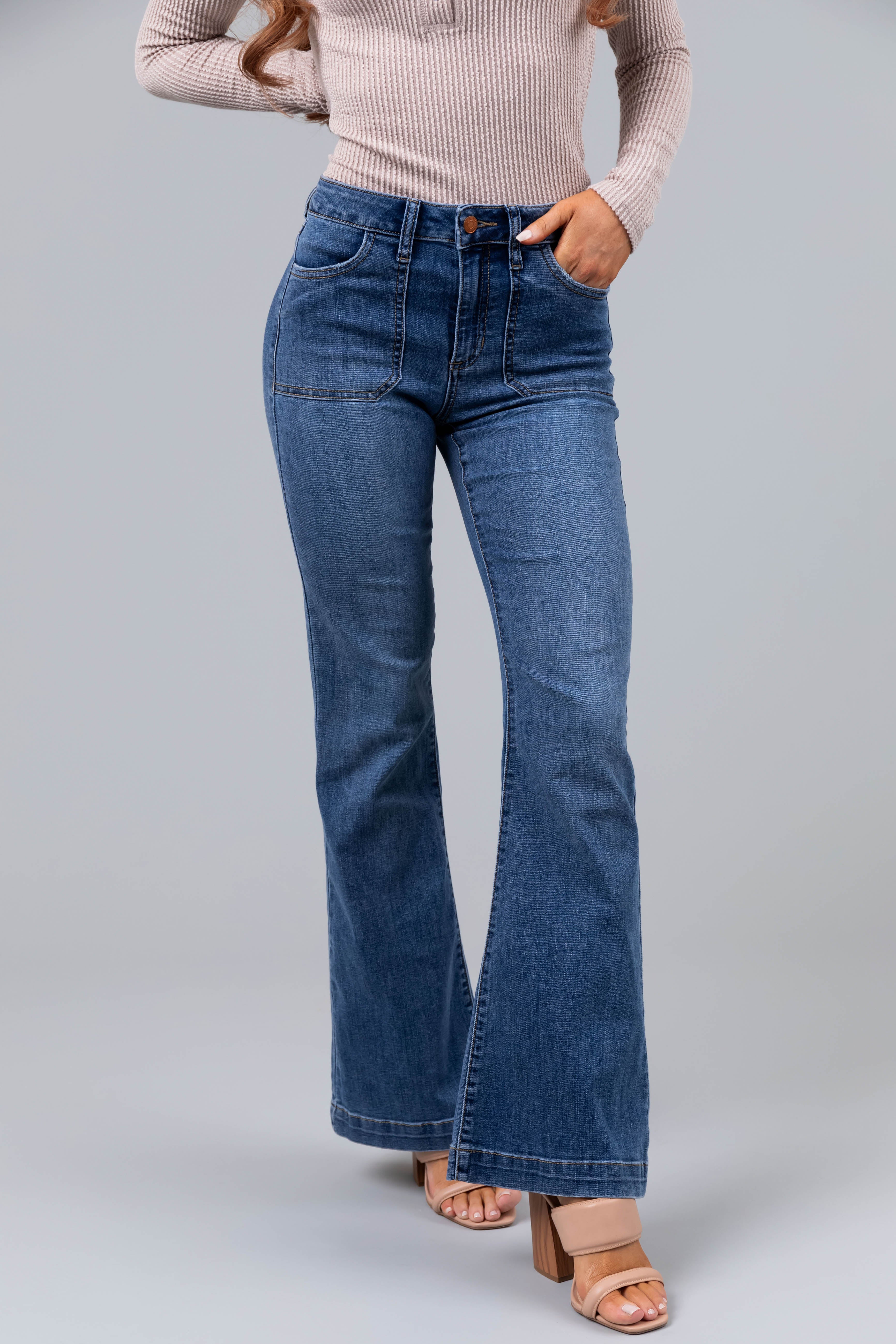 Sneak Peek Medium Wash Mid Rise Flare Jeans