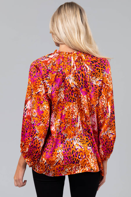 Tangerine Abstract Animal Print 3/4 Sleeve Top